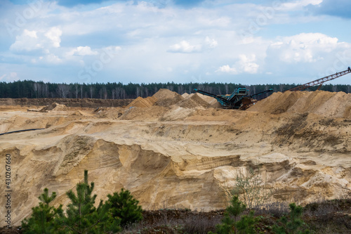 View of the production facility in the sand mine. Made on a sunny day.