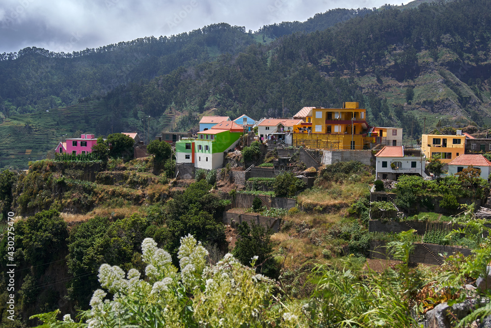 colorful village on top of the mountain, living of terraced cultivation in  Madeira Island