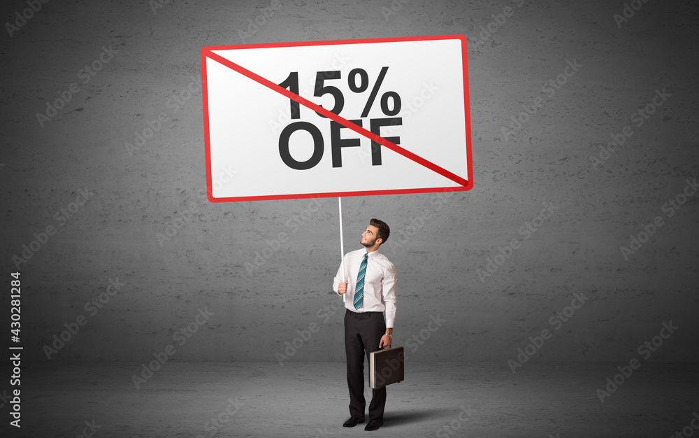 business person holding a traffic sign concept business person holding a traffic sign concept