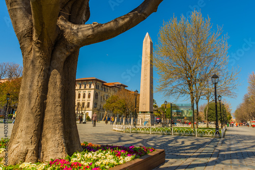 ISTANBUL, TURKEY: Tourists visiting Obelisk of Theodosius in Sultanahmet Square in Istanbul.