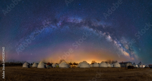 Bild auf Leinwand The milky way and  Mongolia yurts  in grassland.