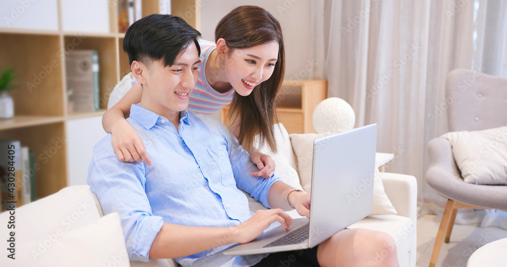 couple use laptop at home couple use laptop at home