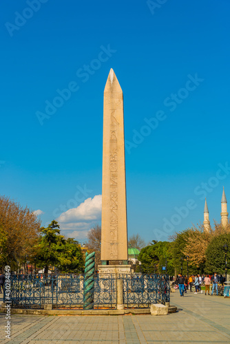 ISTANBUL, TURKEY: Tourists visiting Obelisk of Theodosius in Sultanahmet Square in Istanbul. photo