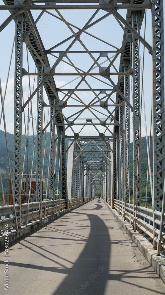a steel bridge across a river