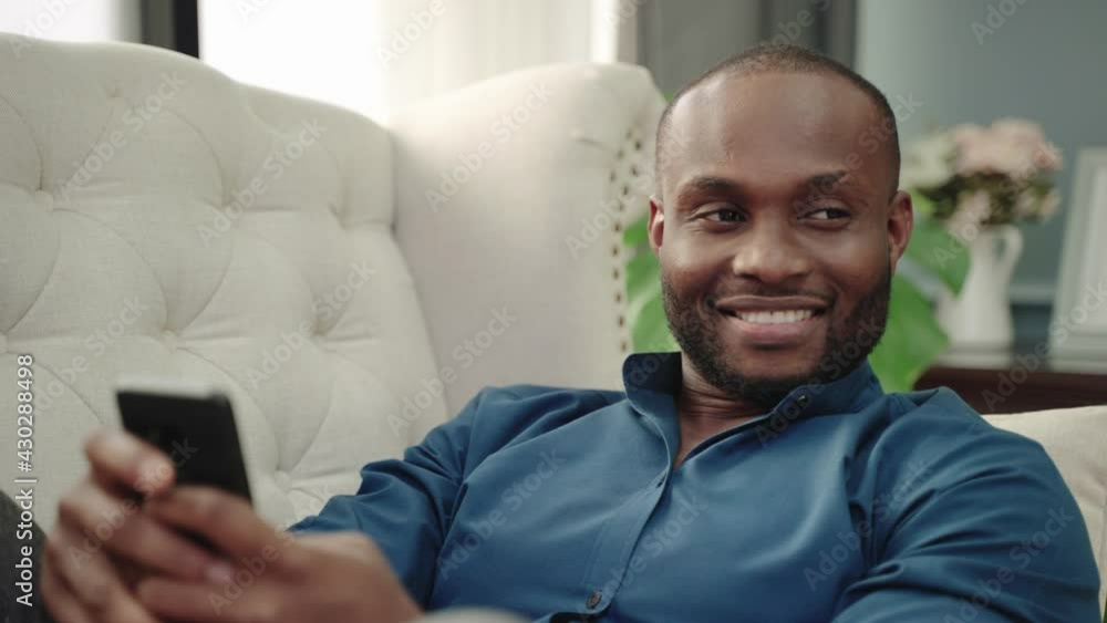 African-American man was smiling on the phone, he happily talked to his loved one.
African-American man was smiling on the phone, he happily talked to his loved one.