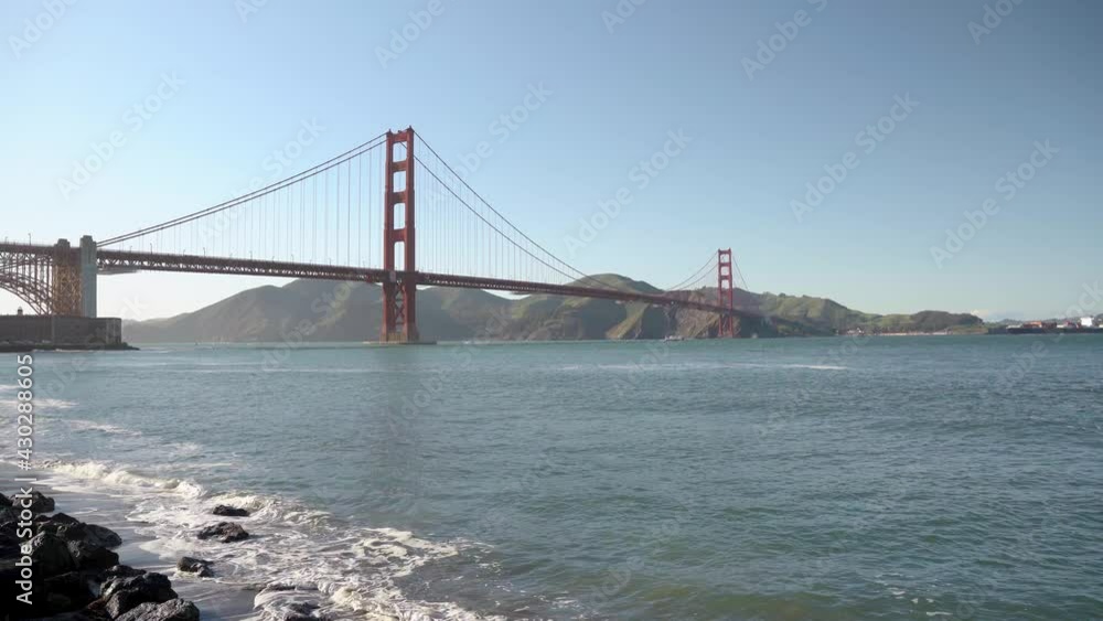 Cargo ship and the panoramic view of the famous Golden Gate Bridge in san Francisco 