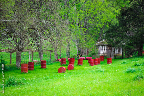field full of barrels