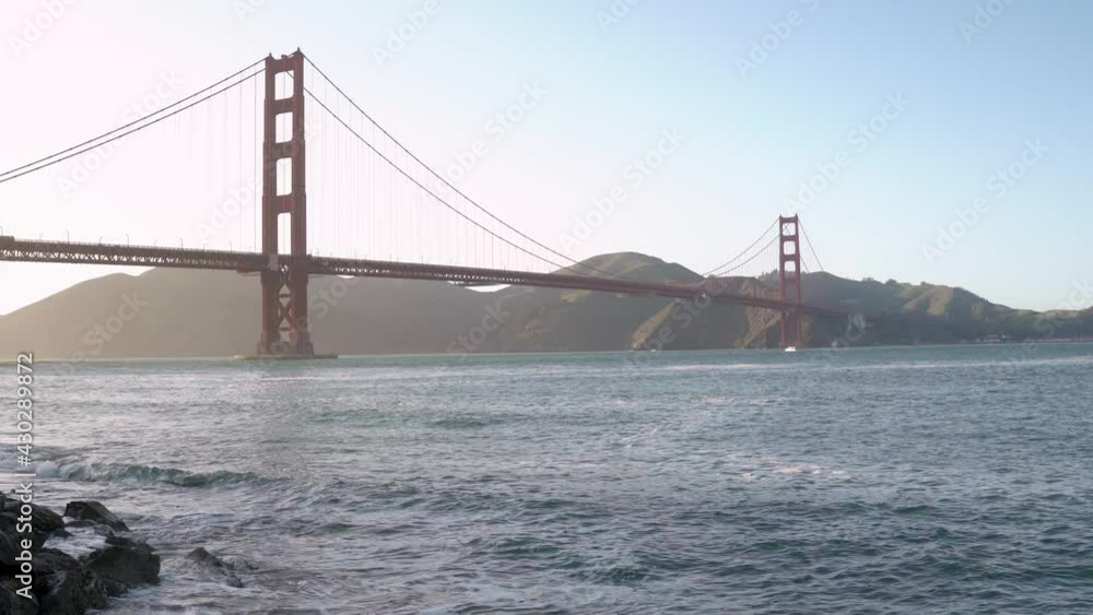 Panorama view of the rocks in the beach and the Golden Gate Bridge in San Francisco, California Panorama view of the rocks in the beach and the Golden Gate Bridge in San Francisco, California