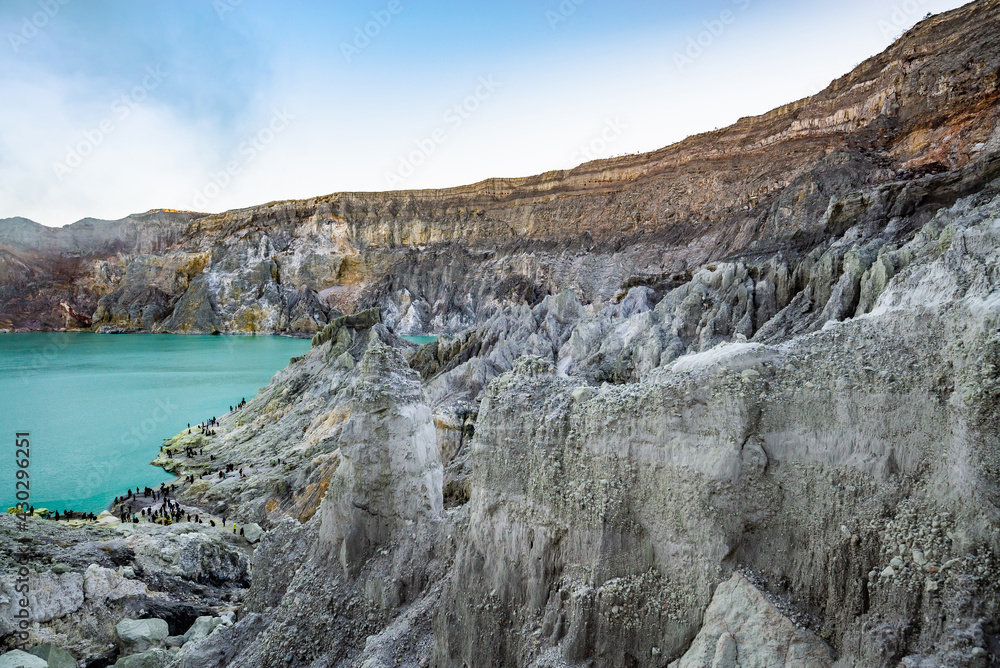 Rock wall and sulphur mining in Ijen crater in the morning in Kawah Ijen volcano Landmark from East Java Indonesia Rock wall and sulphur mining in Ijen crater in the morning in Kawah Ijen volcano Landmark from East Java Indonesia