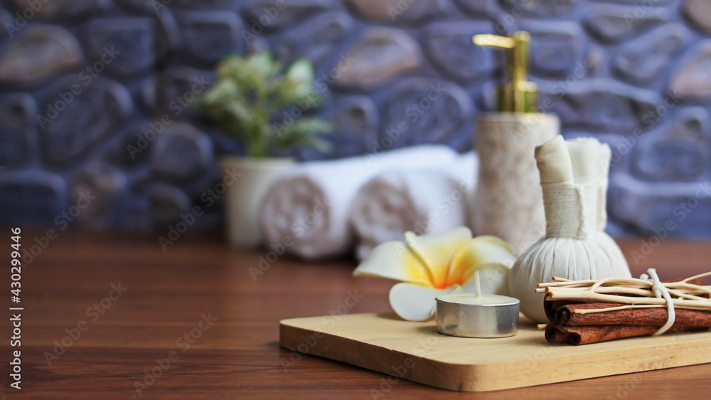 Spa accessories,Beautiful composition of spa , spa relax concept,  herbs for massage, beautiful sap set on wood table,For marketing products