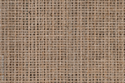 Top view of natural brown hessian or burlap cloth or gunny sack  formed of jute.