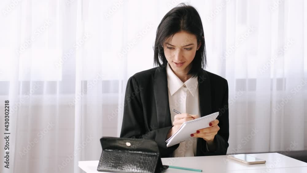 Young woman working with tablet at home Young woman working with tablet at home