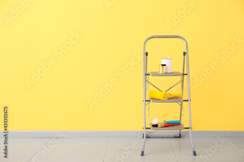 Ladder with cans of paints ...