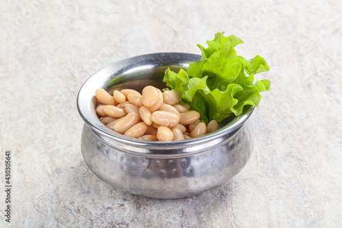 White canned beans for vegan suisine photo