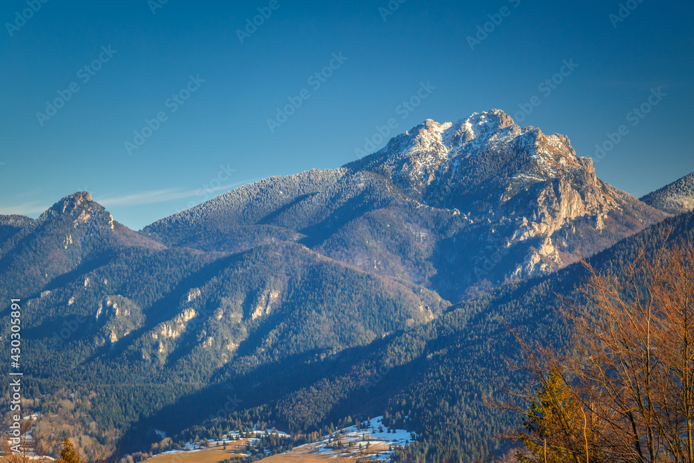 Landscape with mountains in the background at the end of winter. The Mala Fatra national park, Slovakia, Europe.