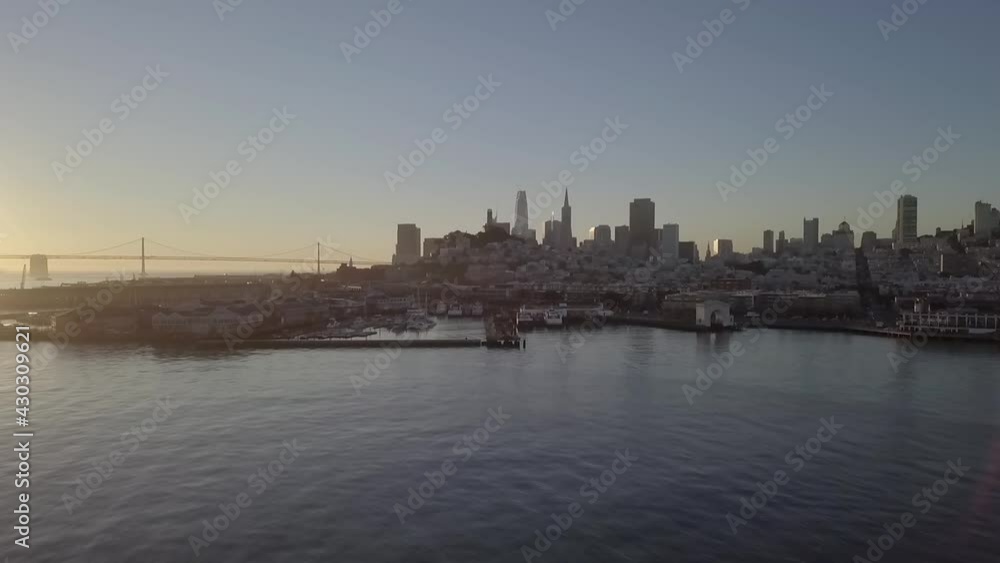 Hazy misty San Francisco landmark cityscape skyline aerial view towards skyscrapers over Pacific ocean Hazy misty San Francisco landmark cityscape skyline aerial view towards skyscrapers over Pacific ocean