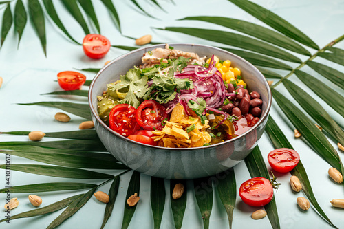 Organic hawaiian chicken poke bowl with rice and vegetables photo