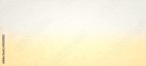 Yellow color gradient with soft glowing backdrop texture abstract background for Christmas, Valentine card, webpage, wallpaper © pakn