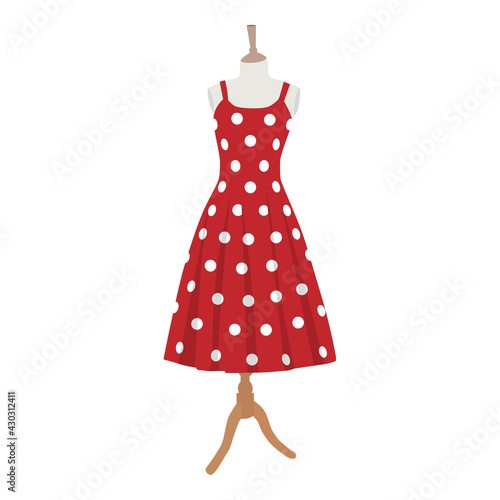 Tela Red dress with polka dots. Female mannequin in red dress