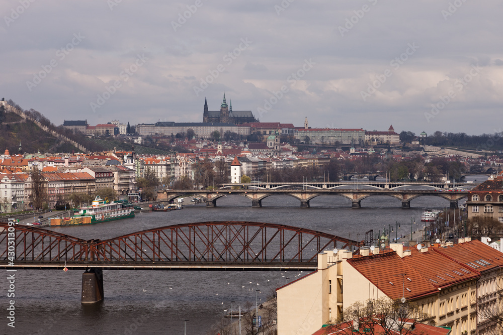 View over Vltava river or Moldau in Prague towards Prague castle and cathedral.