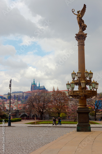 Rudolfinums column in Prague with St. Vitus cathedral in background, Czech Republic. © Fons