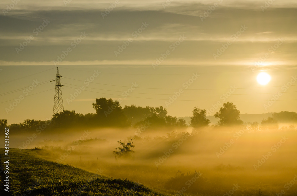Novi Sad, Serbia - October 22, 2015: Exit from the suburbs near Novi Sad. The exit of the first morning rays of the sun at the exit from the suburbs.