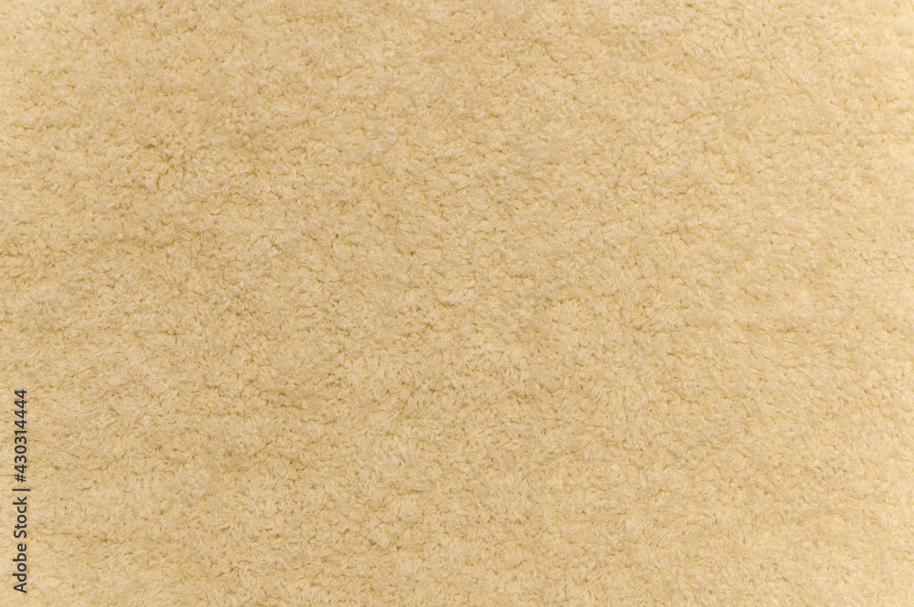 Close up of yellow carpet. Top view of texture of white foot scraper. background. - obrazy, fototapety, plakaty 