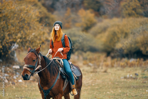 woman hiker riding horse travel mountain walk adventure