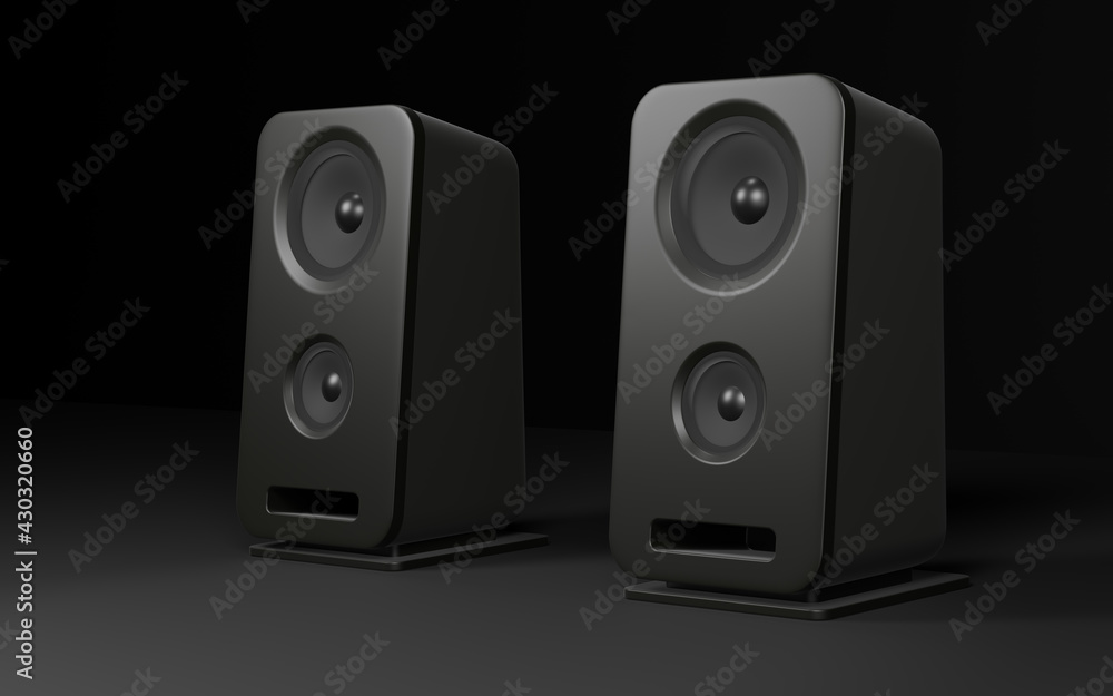 two computer speakers over black background two computer speakers over black background