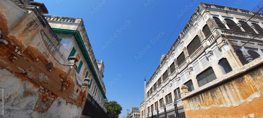 street between two historic mansions wide angle shot street between two historic mansions wide angle shot