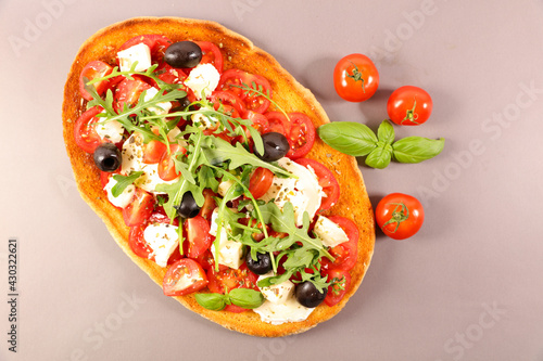 bruschetta with tomato, olive, mozzarella