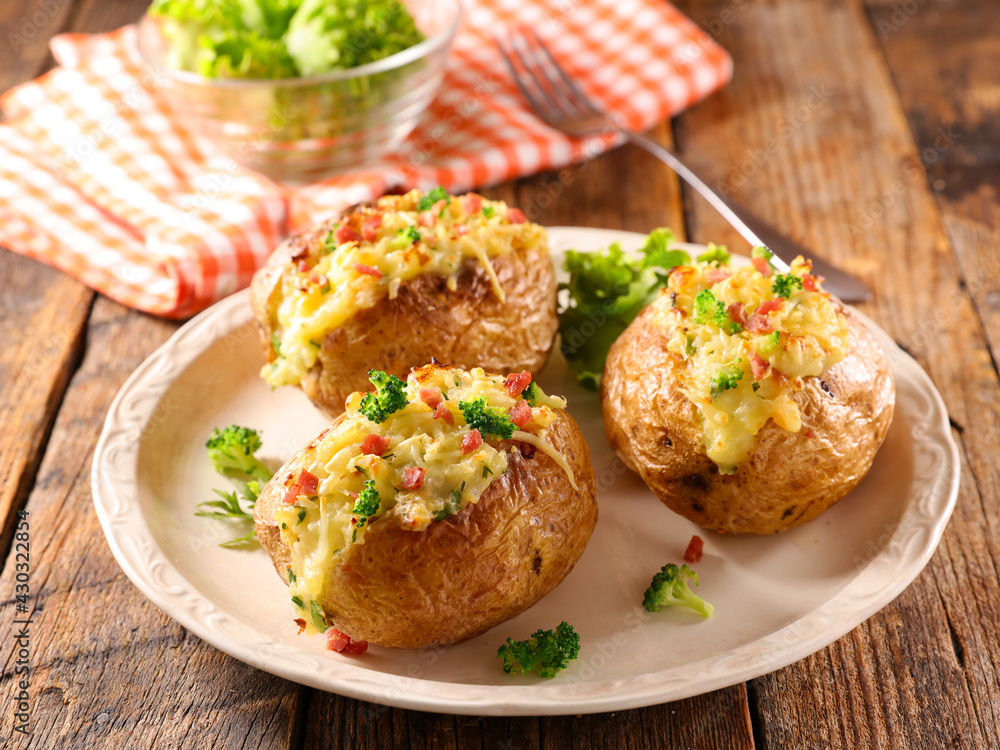 baked potato stuffed with vegetables and cheese
