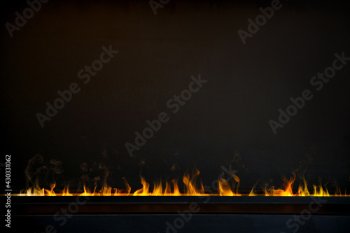 Fire in the fireplace on a black background.
