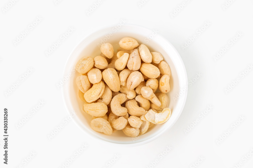 Process of soaking various nuts: cashew in water to activate. Home Cooking: making plant based organic veggie Milk, lactose free. Process of soaking various nuts: cashew in water to activate. Home Cooking: making plant based organic veggie Milk, lactose free.