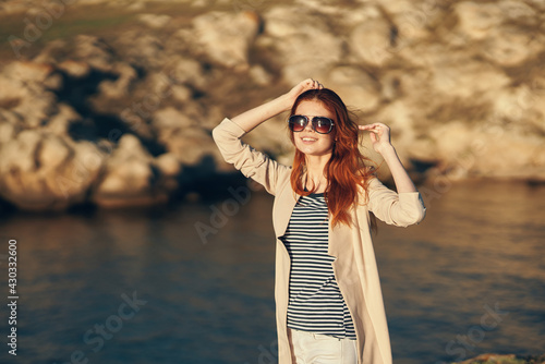 woman hiker outdoors in the mountains near the river fresh air landscape vacation model © SHOTPRIME STUDIO
