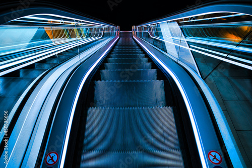 moving escalator in the subway photo