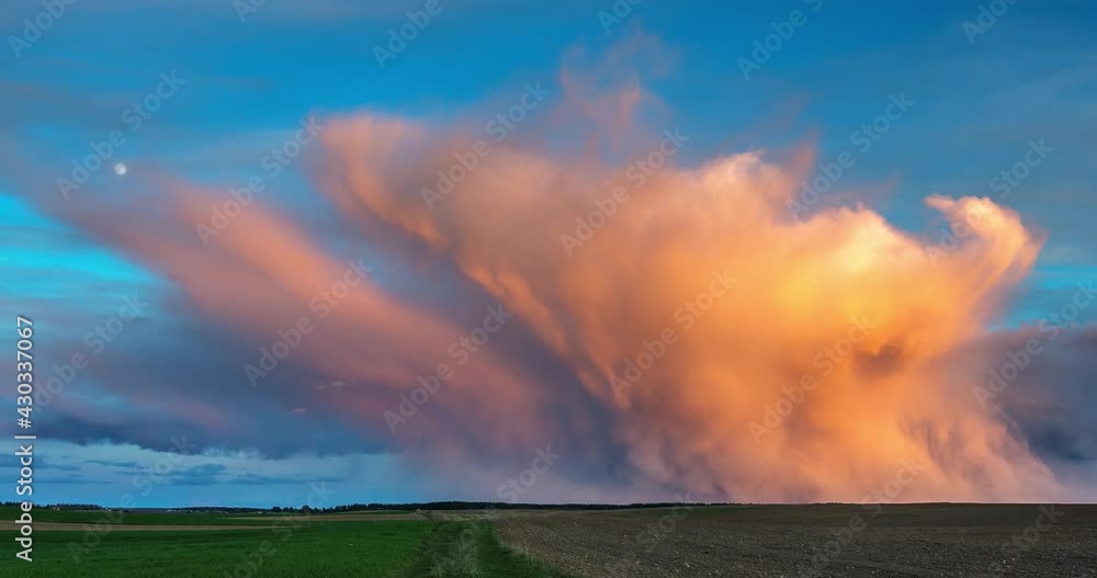 Mammatus Clouds at Sunset Timelapse with moon Mammatus Clouds at Sunset Timelapse with moon