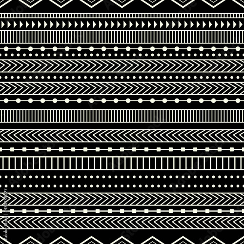Ethnic and monochrome pattern. Black background and primitive ethnic forms.