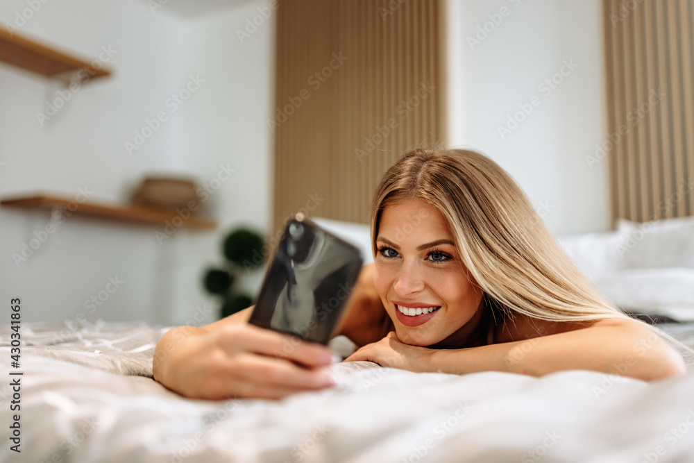 Woman with long blonde hair and blue eyes. Woman with long blonde hair and blue eyes.