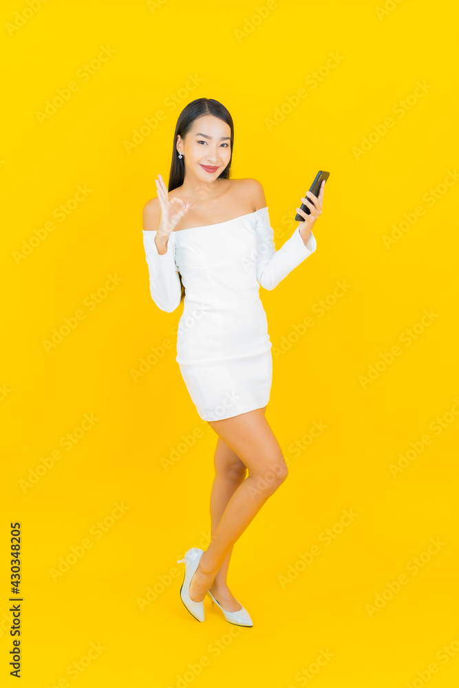 Portrait beautiful young business asian woman with smart mobile phone Portrait beautiful young business asian woman with smart mobile phone