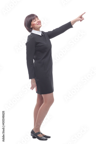 side view. young woman in business clothes looking at the camera .