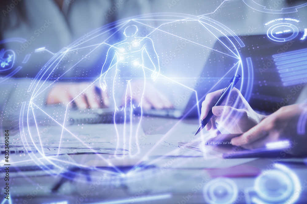 Double exposure of woman hands typing on computer and general theme hologram drawing. Education concept. Double exposure of woman hands typing on computer and general theme hologram drawing. Education concept.