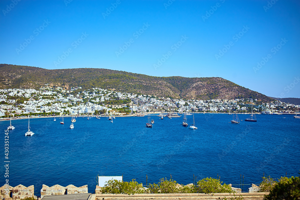 View of Aegean sea, traditional white houses marina from Bodrum Castle, Turkey