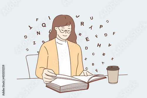 Entertainment relaxation with coffee concept. Young positive woman cartoon character sitting reading book while drinking coffee at table vector illustration 