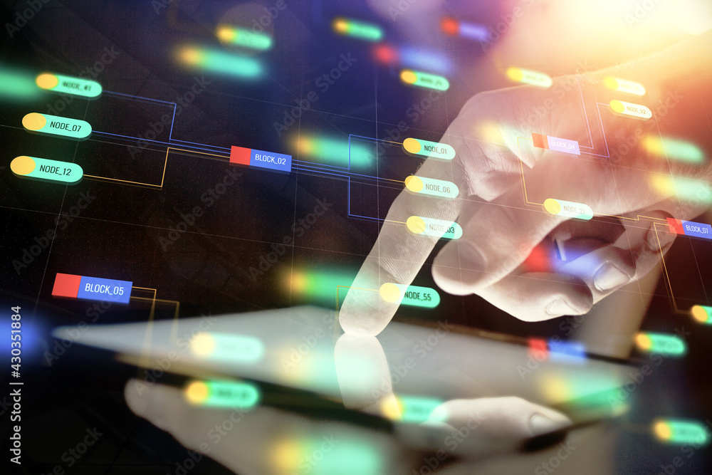 Double exposure of man's hand holding and using a digital device and data theme hologram drawing. Technology concept. Double exposure of man's hand holding and using a digital device and data theme hologram drawing. Technology concept.