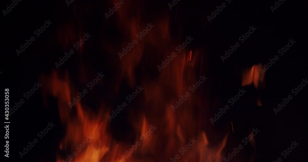The top of the fire from the fire at night. Close-up The top of the fire from the fire at night. Close-up