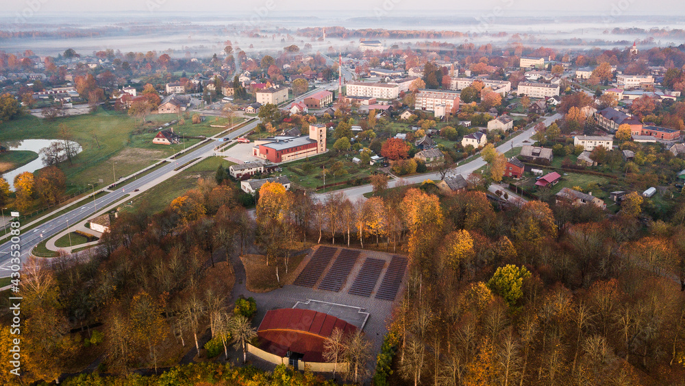 Aerial view of Skrunda town on a foggy autumn morning, Latvia.