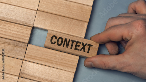 Obraz na plátne CONTEXT word concept. Close-up wooden piece blocks on the table