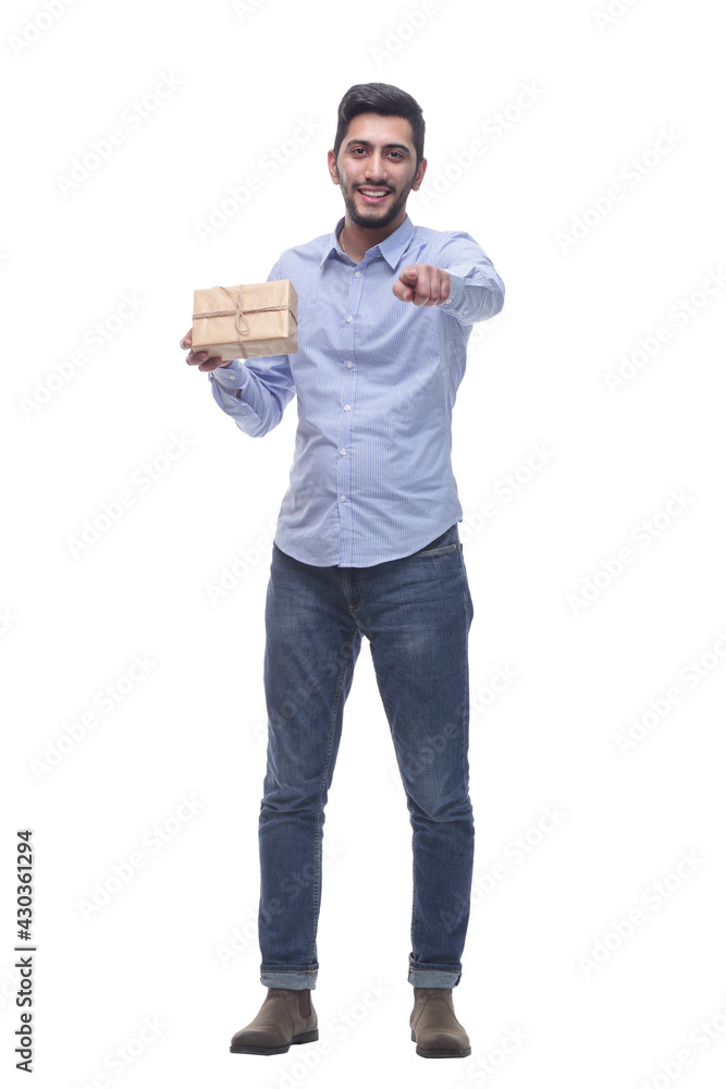 happy young man with a gift in craft-paper. happy young man with a gift in craft-paper.