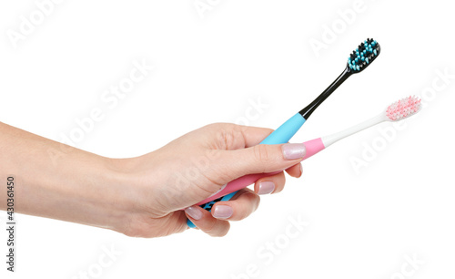 Pink and blue dental toothbrush isolated on white background